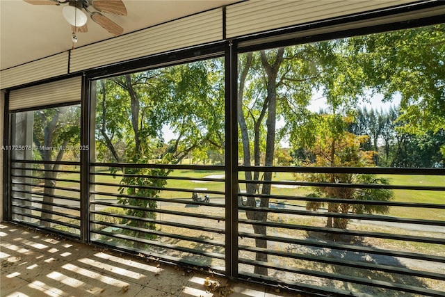 exterior space featuring ceiling fan