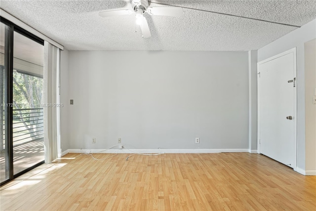 spare room featuring ceiling fan, a textured ceiling, basketball hoop, and light hardwood / wood-style floors