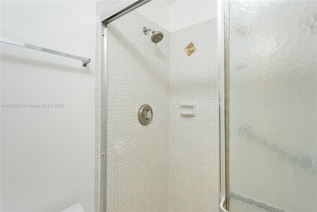 bathroom with an enclosed shower