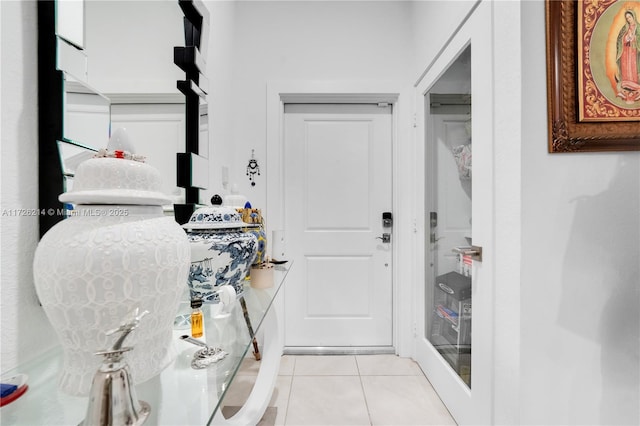 interior space with light tile patterned floors