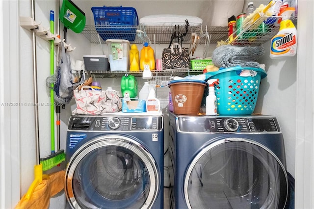 laundry area with washing machine and dryer and laundry area