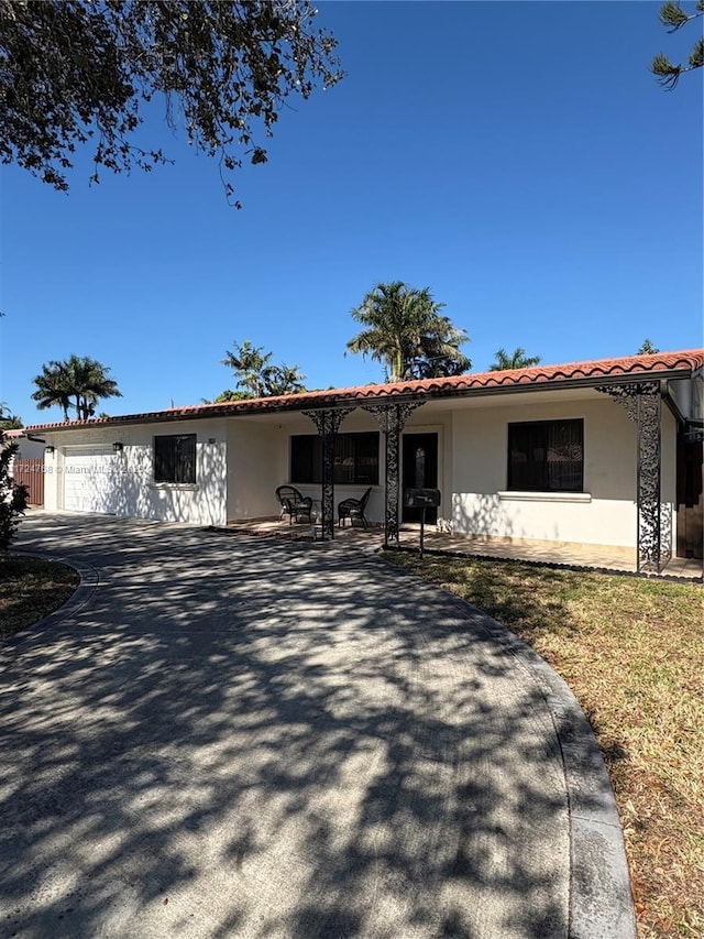 view of front of home with a garage