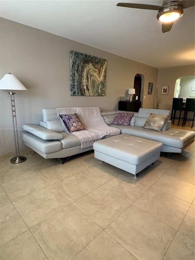 living room featuring ceiling fan