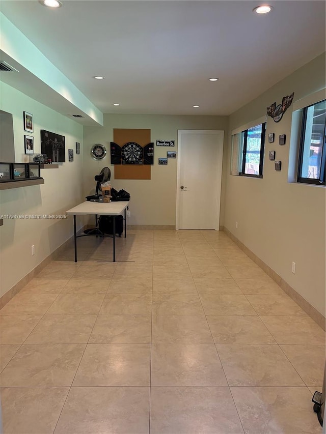 interior space featuring light tile patterned floors