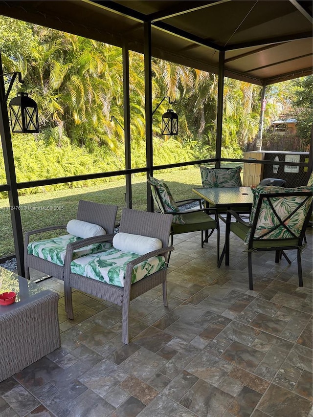 sunroom with a healthy amount of sunlight