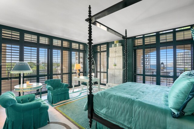 hallway featuring sink and light tile patterned floors