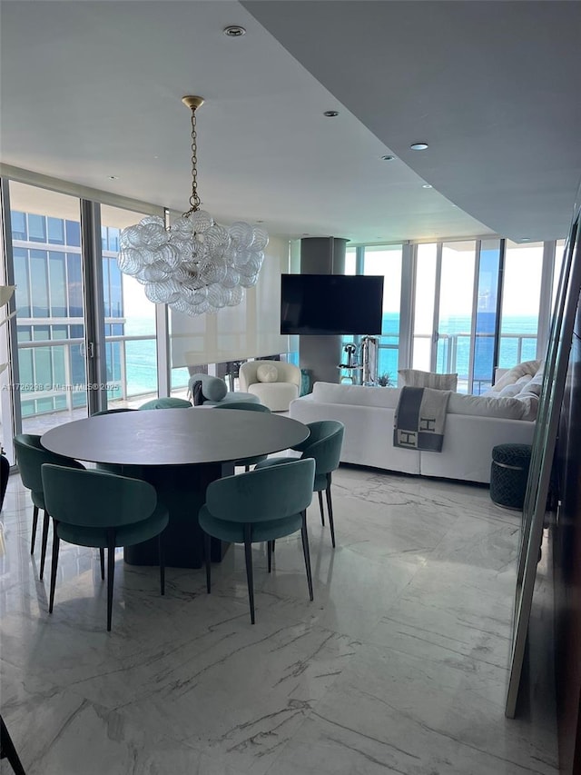 dining space featuring a chandelier