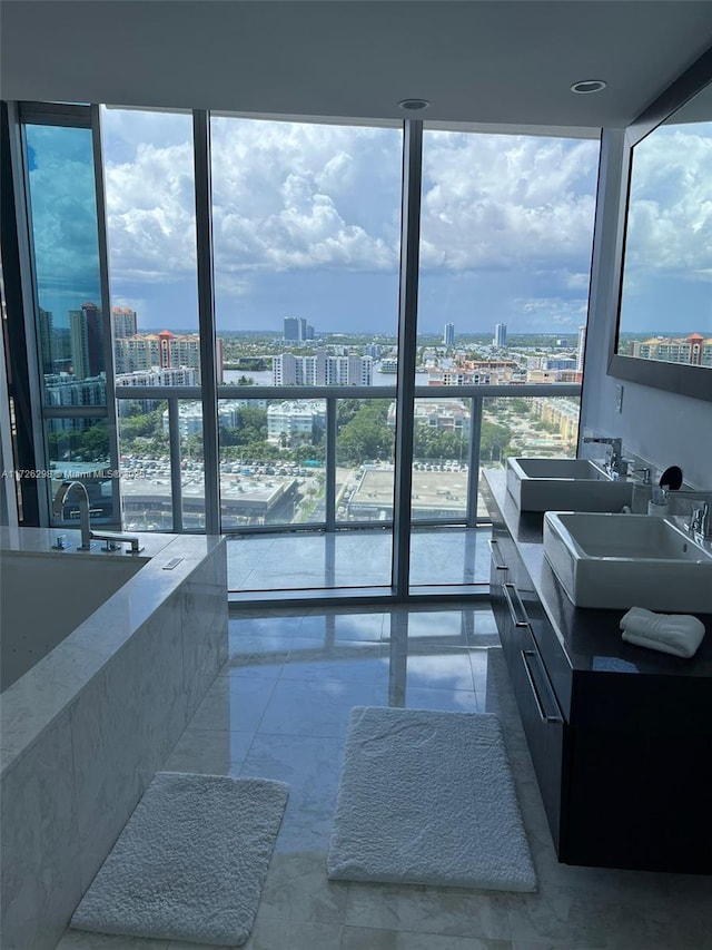 interior space featuring a wall of windows and sink