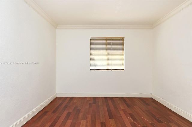 empty room with crown molding and dark hardwood / wood-style floors