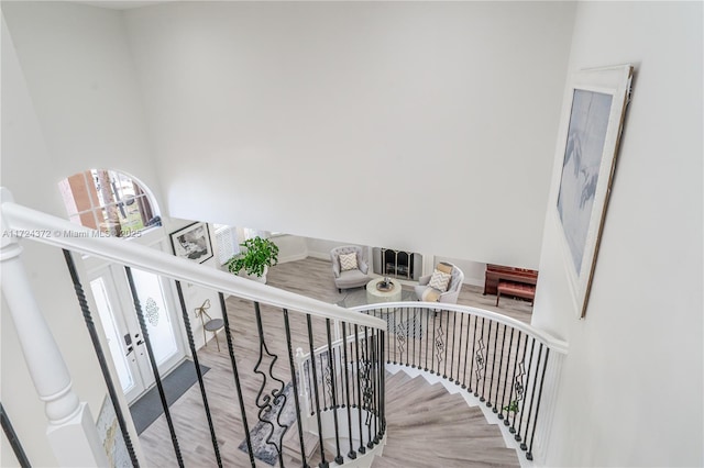 staircase featuring hardwood / wood-style flooring