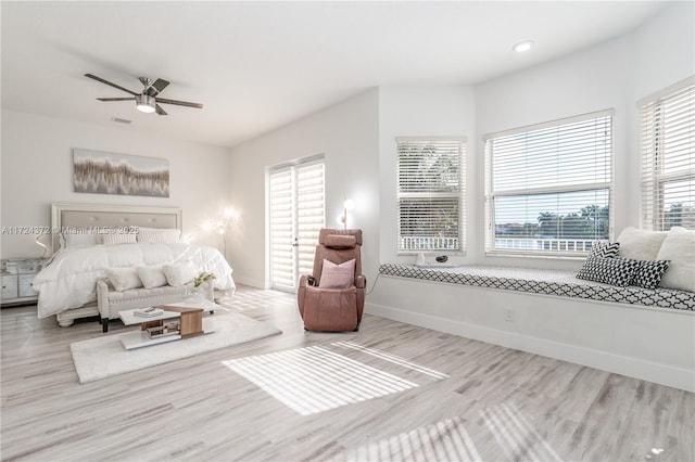 bedroom featuring ceiling fan and wood-type flooring