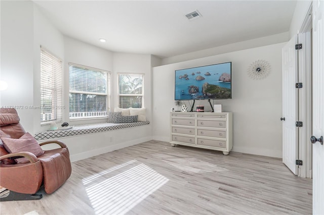 living area featuring light wood-type flooring