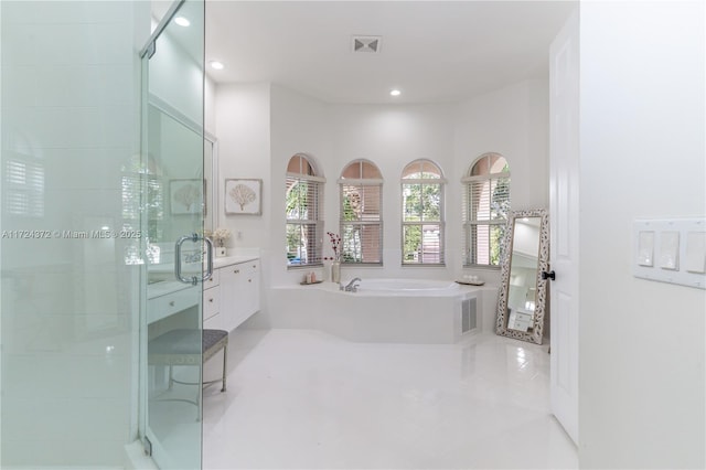 bathroom with separate shower and tub, tile patterned flooring, a towering ceiling, and vanity