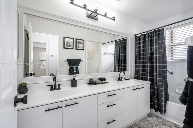 bathroom featuring shower / bath combination with curtain and vanity