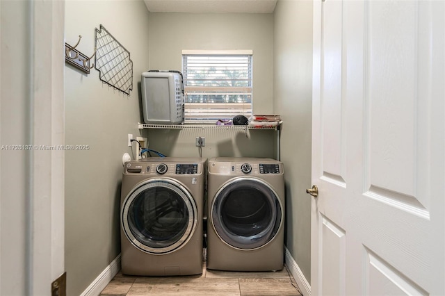 laundry area featuring independent washer and dryer