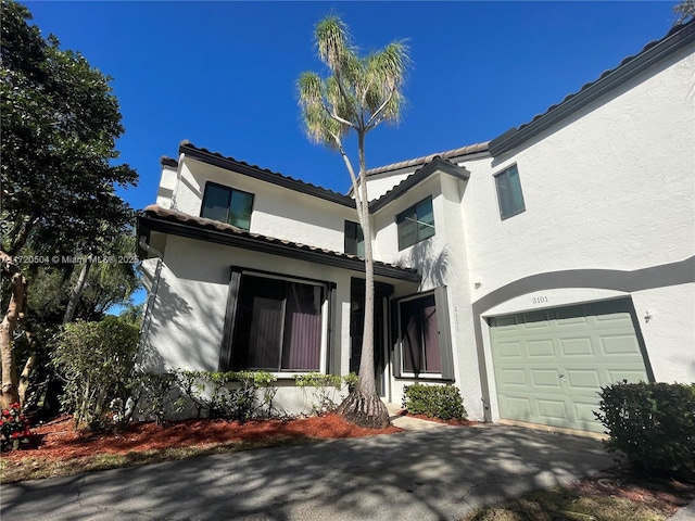 view of front of home with a garage