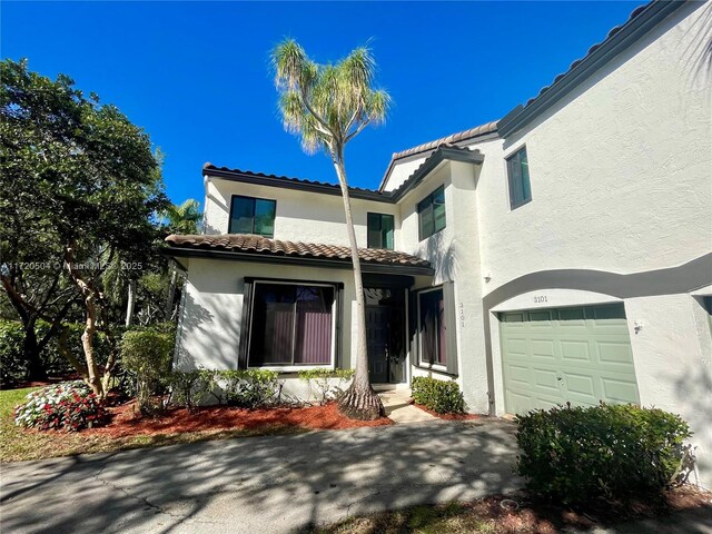 view of front of home with a garage