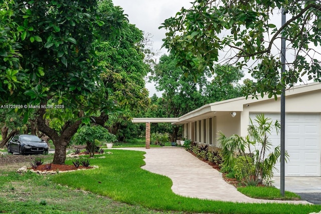 view of yard with an attached garage