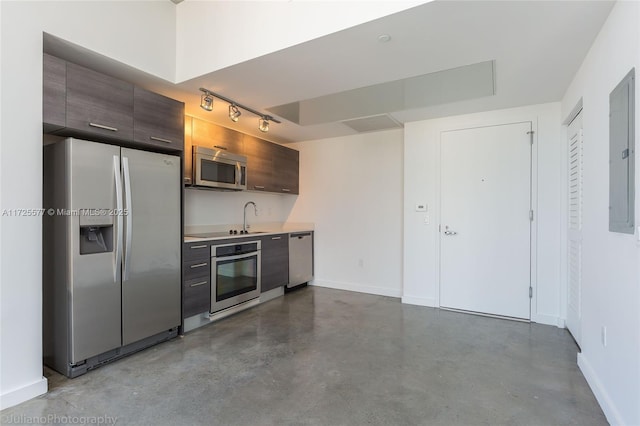 kitchen with stainless steel appliances, sink, and electric panel