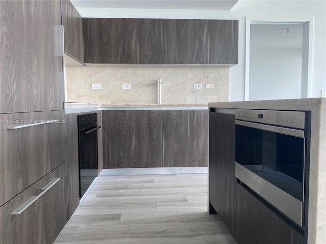 kitchen featuring sink and oven