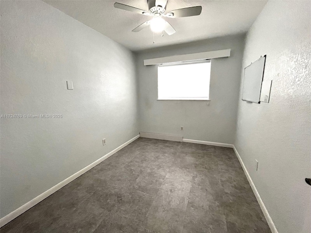 unfurnished room with ceiling fan