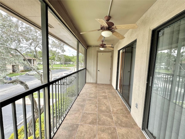 balcony featuring ceiling fan