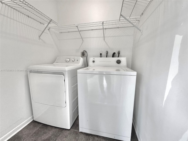 washroom with independent washer and dryer