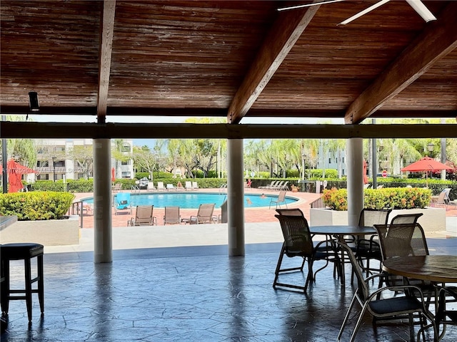 view of patio featuring a community pool