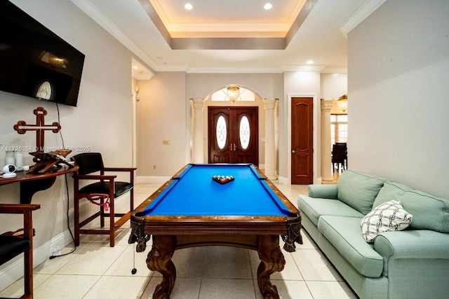 recreation room with a tray ceiling, plenty of natural light, baseboards, and billiards