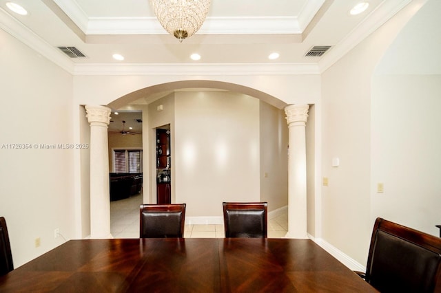 unfurnished dining area featuring arched walkways, light tile patterned flooring, visible vents, and ornate columns