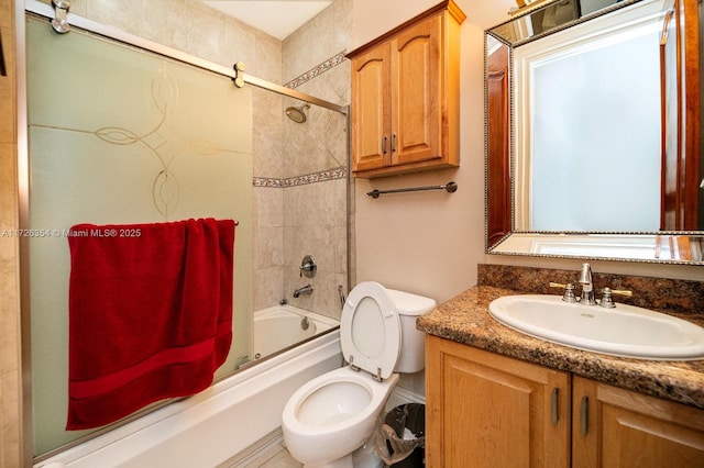 full bath with toilet, bathtub / shower combination, and vanity