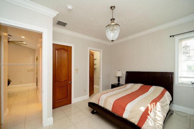 bedroom featuring light tile patterned floors, ornamental molding, visible vents, and baseboards