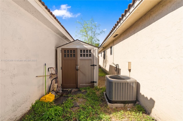 view of exterior entry with central AC