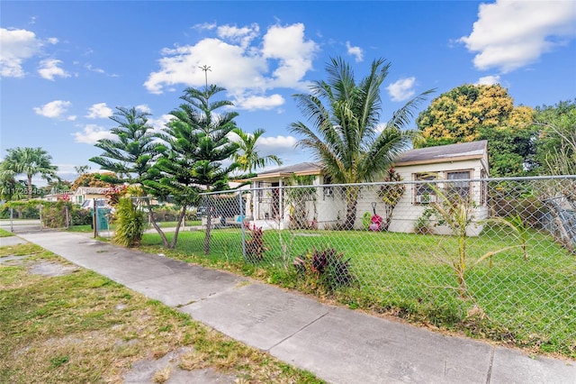 surrounding community featuring a lawn