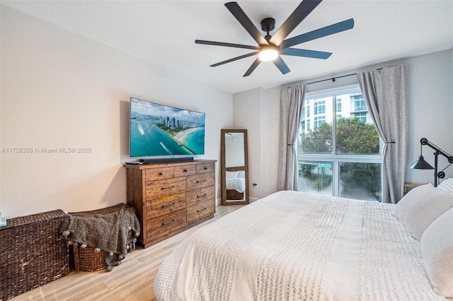 bedroom featuring ceiling fan and wood finished floors