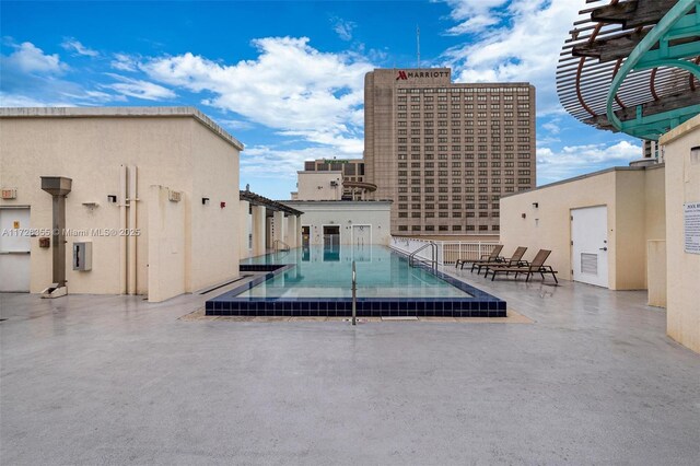 view of pool with a patio