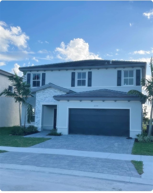 front of property featuring a garage