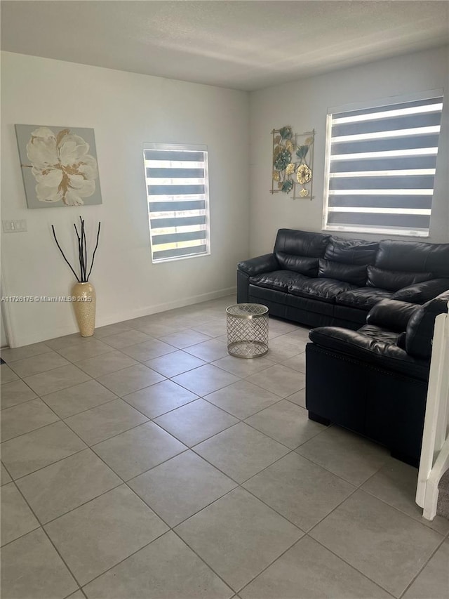 living room featuring light tile patterned floors