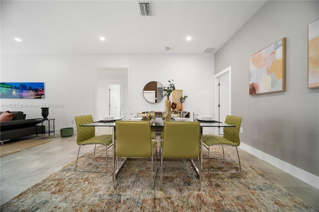 dining room with concrete flooring