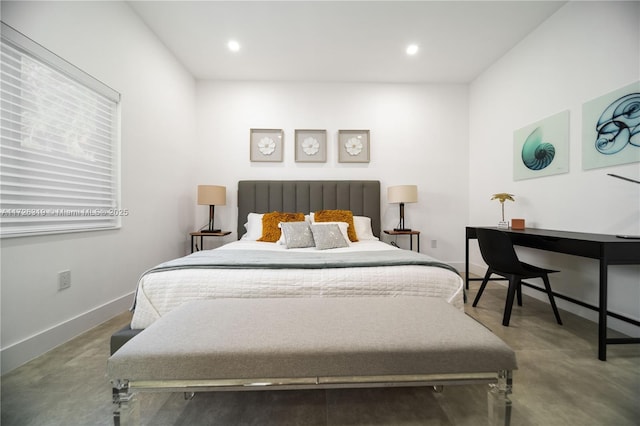 bedroom with concrete flooring