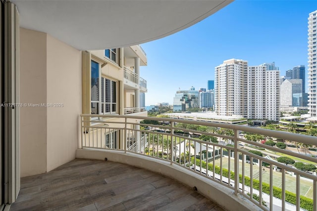 balcony featuring a city view