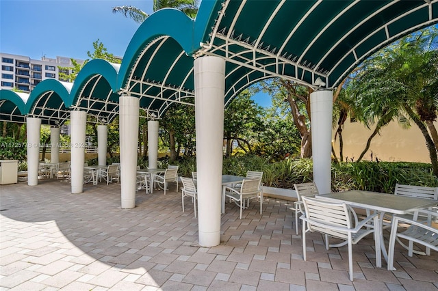 view of patio featuring outdoor dining area