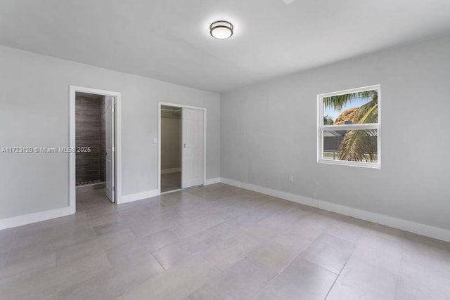 unfurnished bedroom featuring a closet