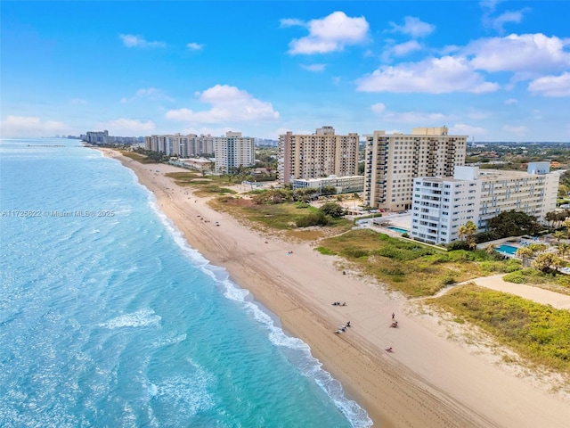 drone / aerial view with a view of the beach and a water view