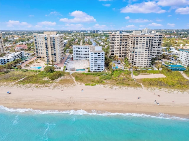 aerial view with a beach view and a water view