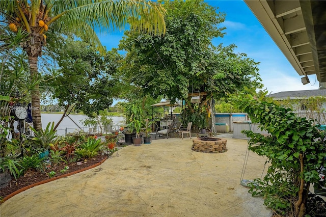 view of patio / terrace featuring a fire pit