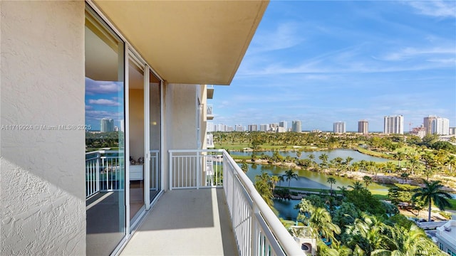 balcony featuring a water view