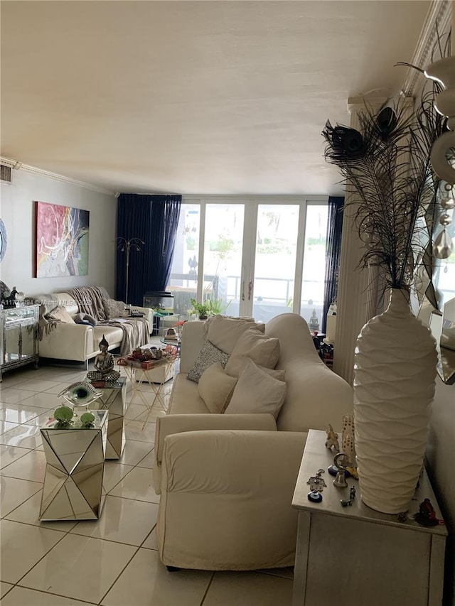 living room featuring french doors, light tile patterned floors, and a wealth of natural light