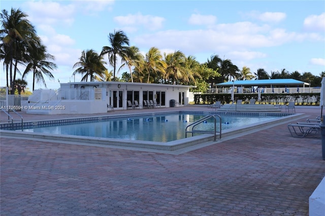 view of swimming pool with a patio