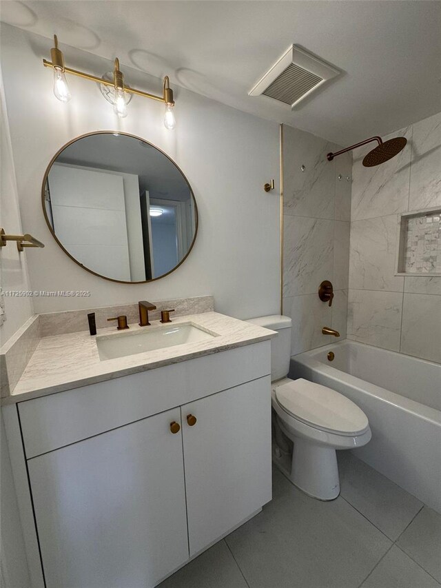 full bathroom with tiled shower / bath combo, vanity, tile patterned flooring, and toilet